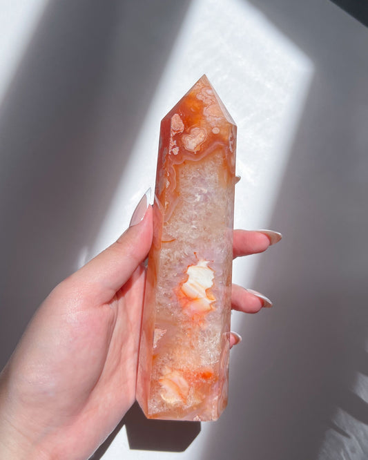 Close-up of Saffron tower highlighting fiery saffron-like patterns and layered agate textures