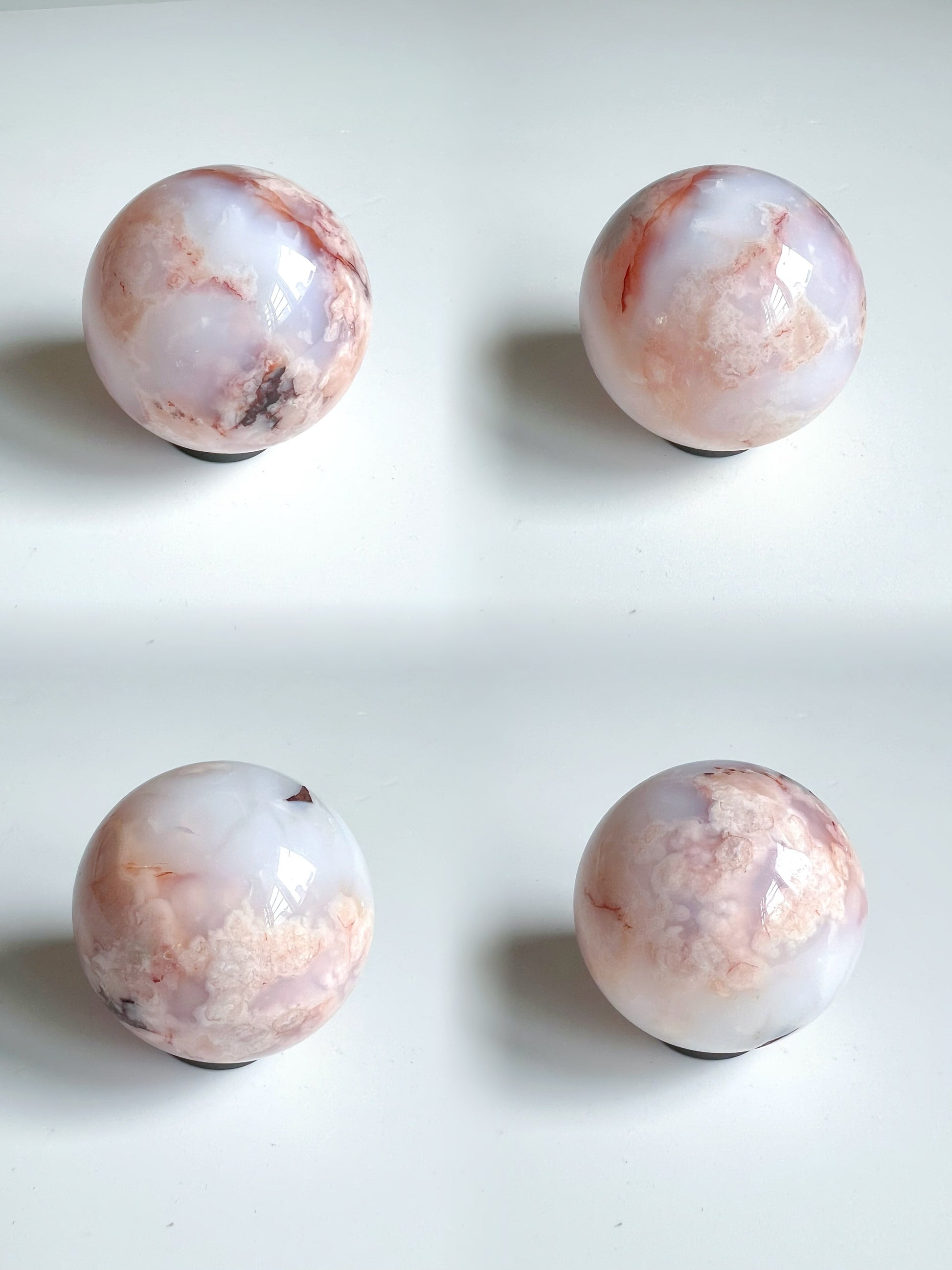 Collage of a Carnelian Flower Agate sphere displaying intricate flower-like formations, cloudy white-pink banding, and soft mineral blooms.