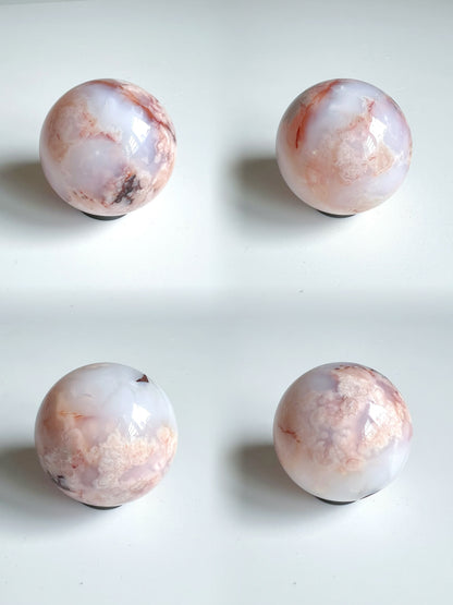 Collage of a Carnelian Flower Agate sphere displaying intricate flower-like formations, cloudy white-pink banding, and soft mineral blooms.