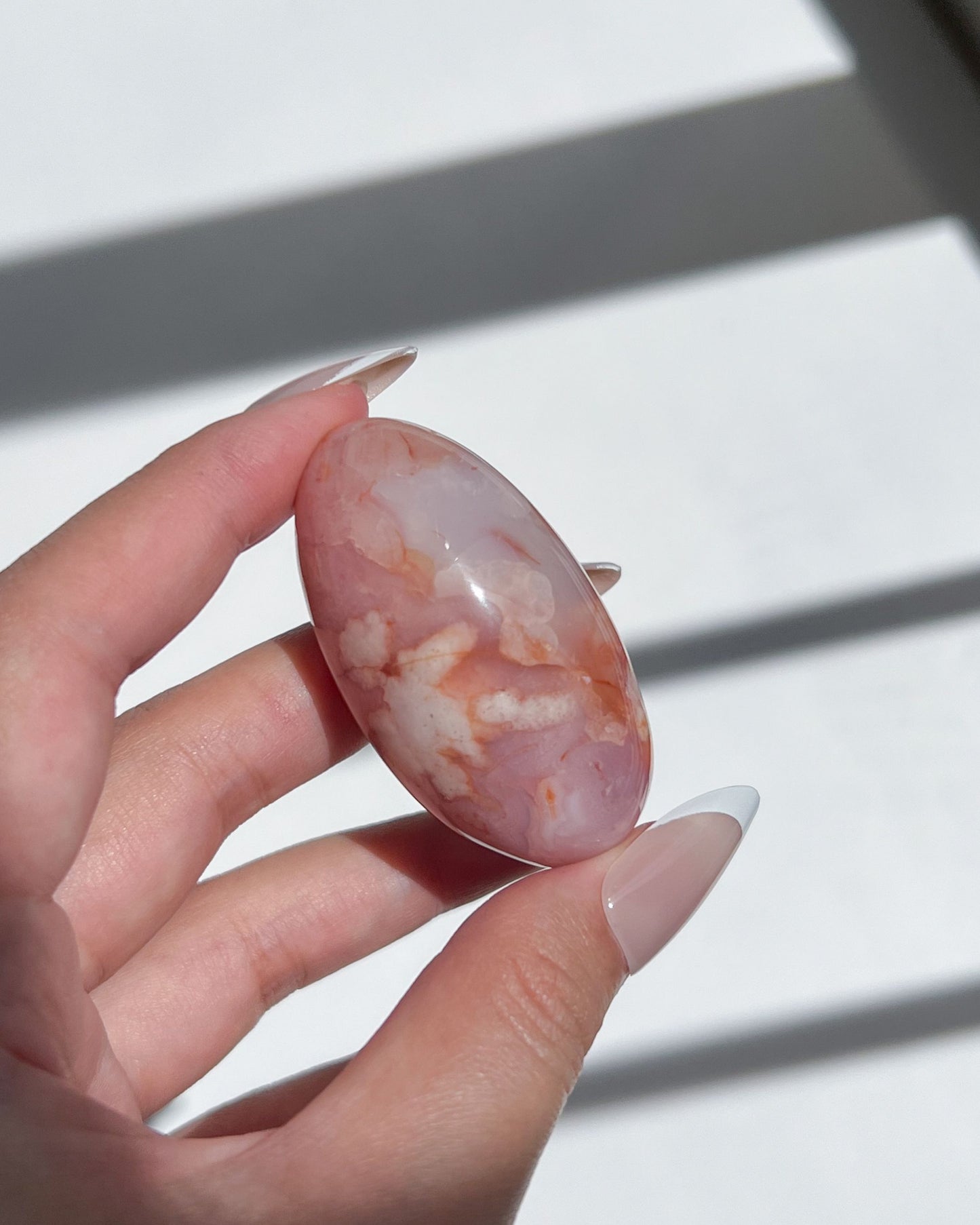 Dreamy Carnelian Flower Agate bean featuring rosy pink hues and creamy flower plumes