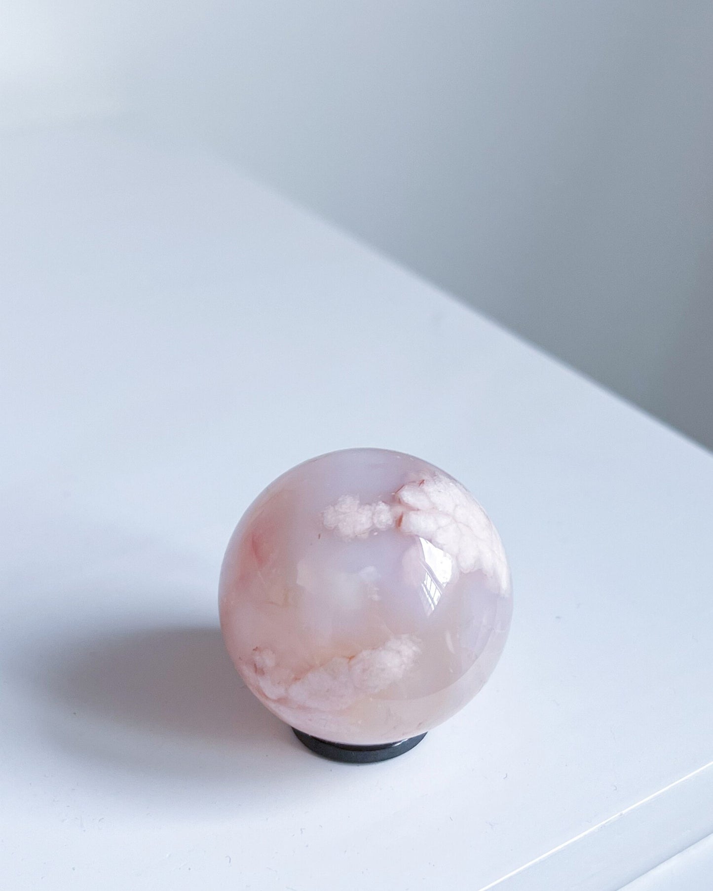 Sphere 10 Suki with distinct puffy plumes and dreamy cloud-like formations on white base