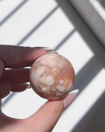 Second angle of Sphere 11 revealing more intricate white plumes and light caramel translucency