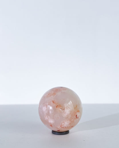Clean product image of Hana, featuring a peachy surface with faint white blooms.