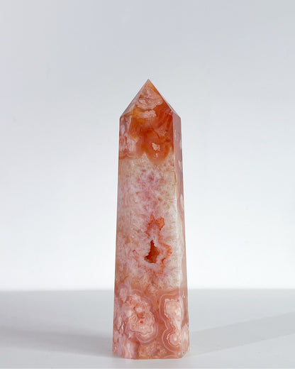 Detail shots of Saffron's soft quartz textures and glowing orange flower-like formations