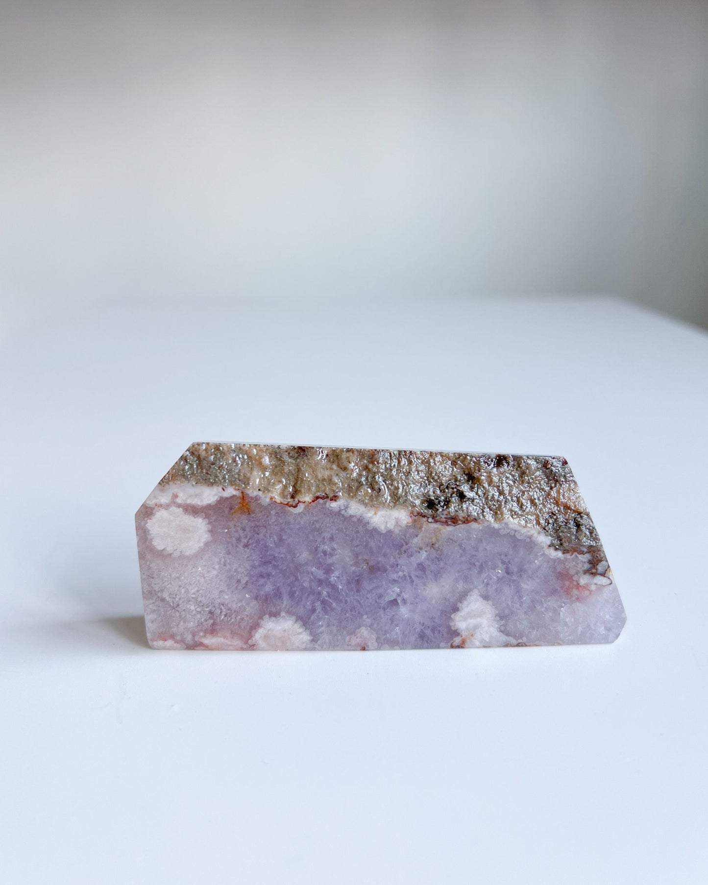 Back-facing image of Leia flower agate slab on white background