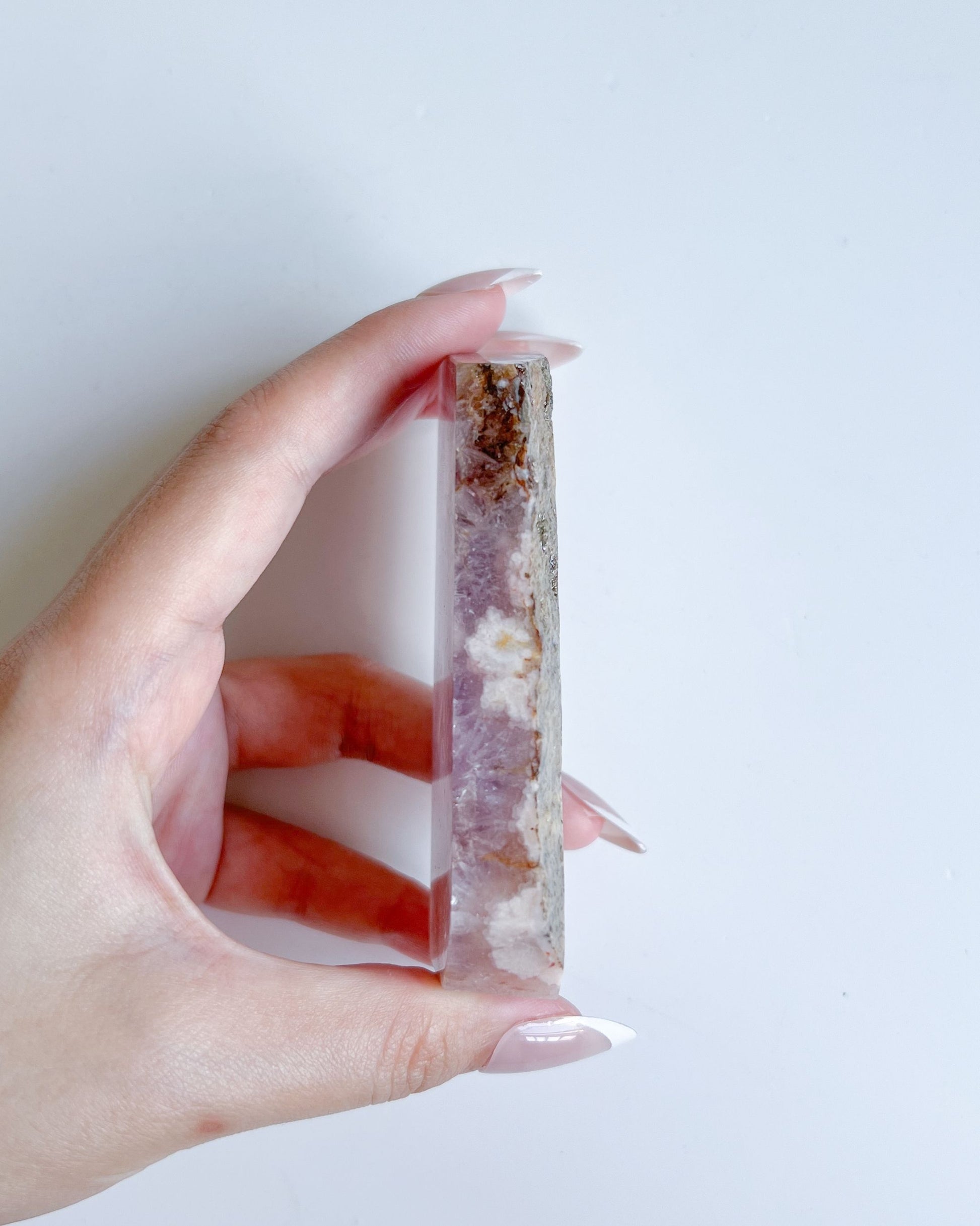 Side view showing the thickness and layering of the flower agate slab