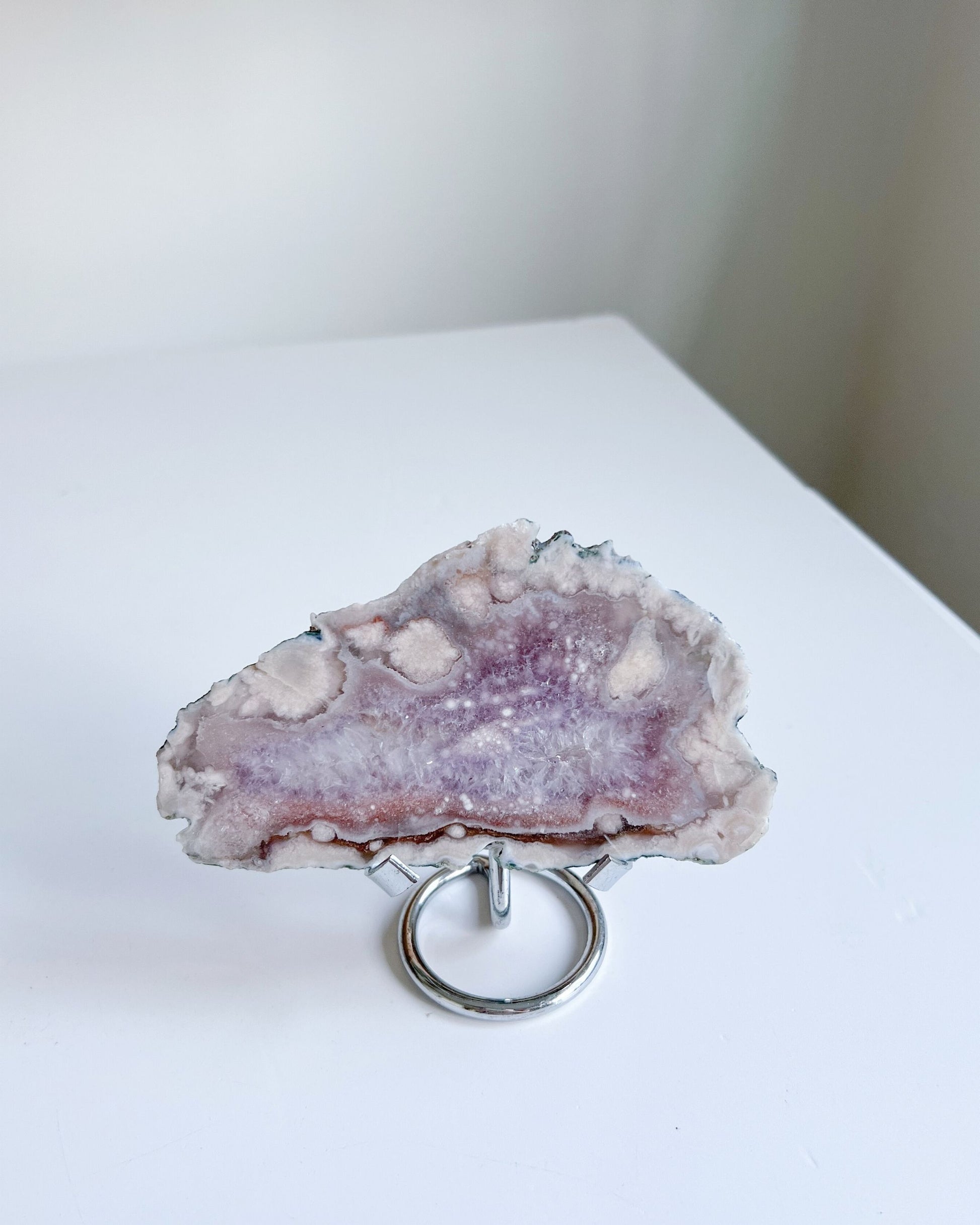 Eleanor standing on metal stand, showing intricate crystal details and soft shimmer