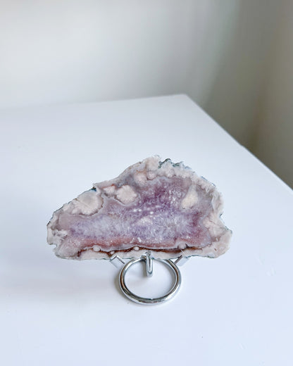Eleanor standing on metal stand, showing intricate crystal details and soft shimmer