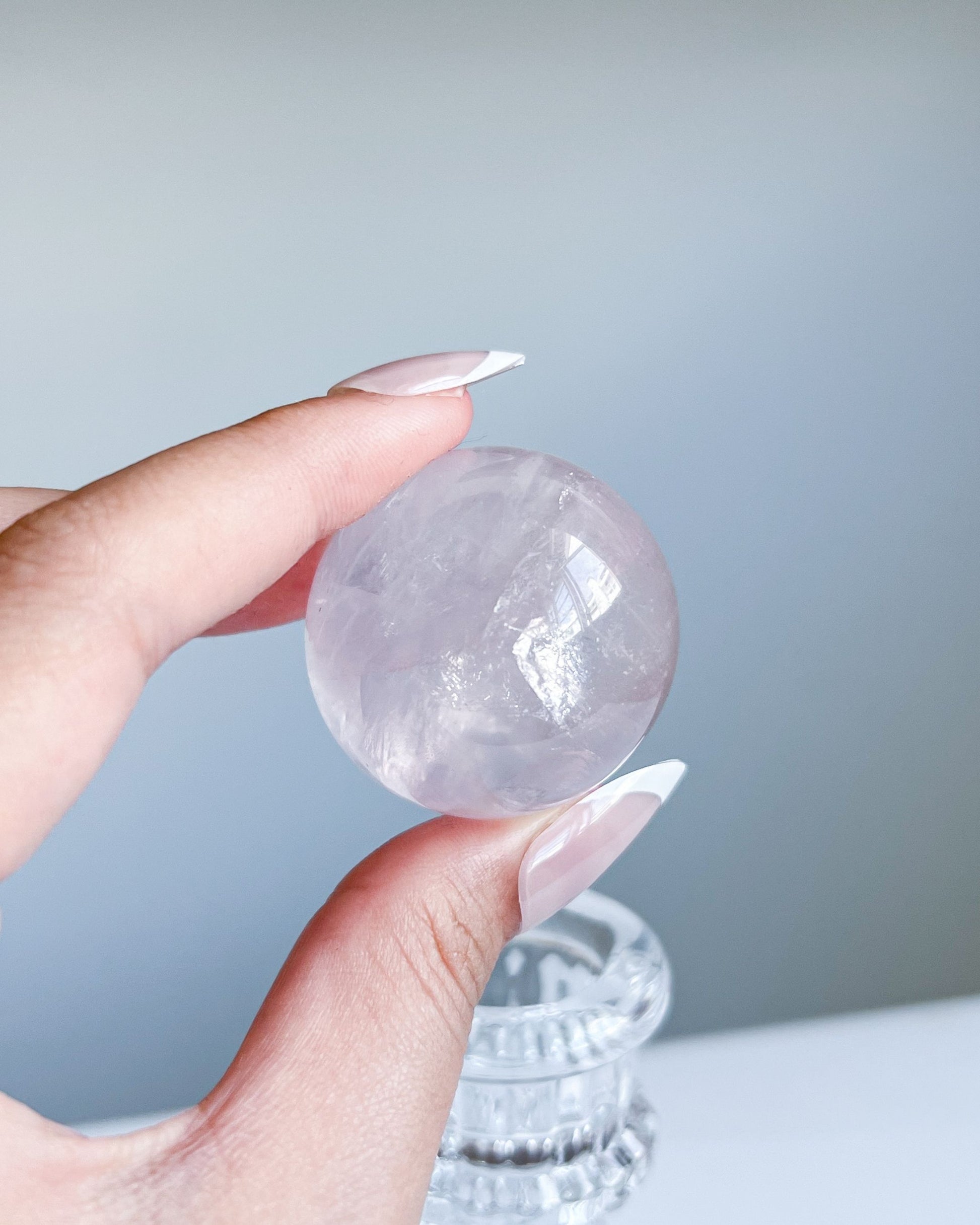 Crystal-clear Girasol Rose Quartz sphere with gentle lilac undertones and natural inner patterns
