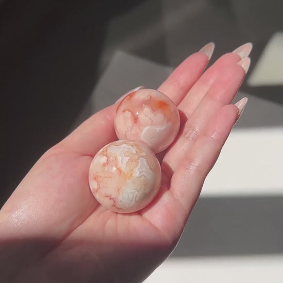 Compilation of Carnelian Flower Agate Spheres 8 to 9 in sunlight.